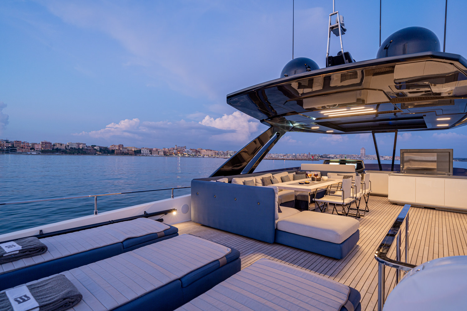 Luxury yacht deck at dusk captured by a yacht photographer in Cannes
