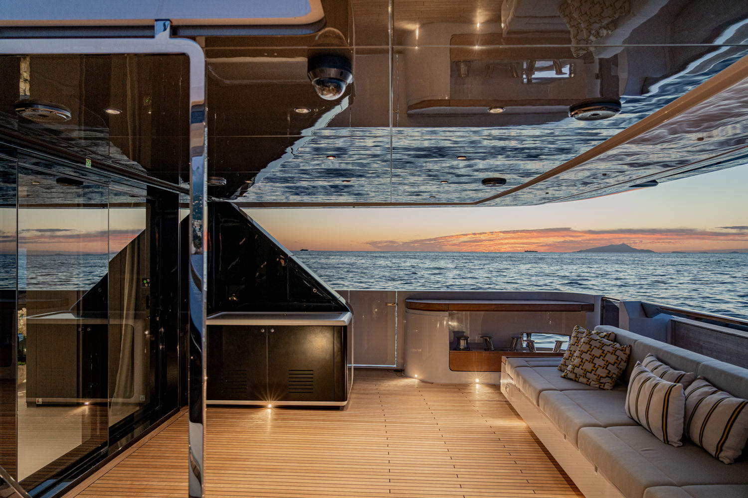 Stunning luxury yacht exterior with expansive deck and panoramic ocean views, captured during a yacht photoshoot in Cannes