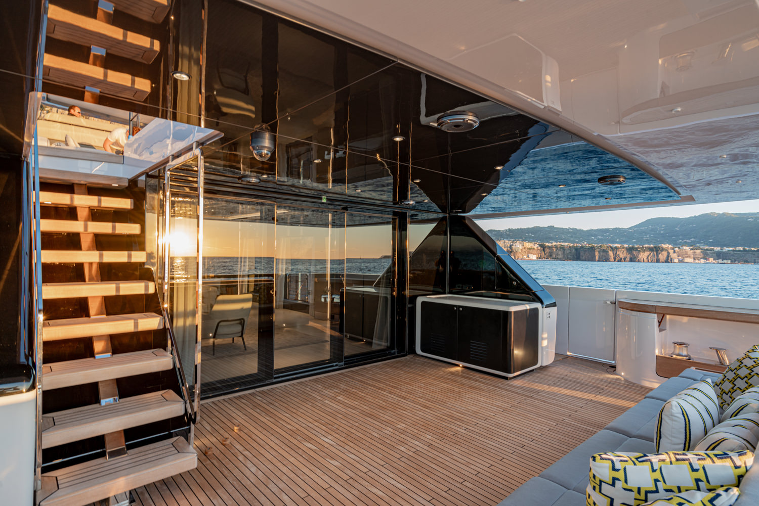 Stunning exterior of a luxury yacht with a beautiful sunset view captured during a yacht photoshoot in Saint-Tropez