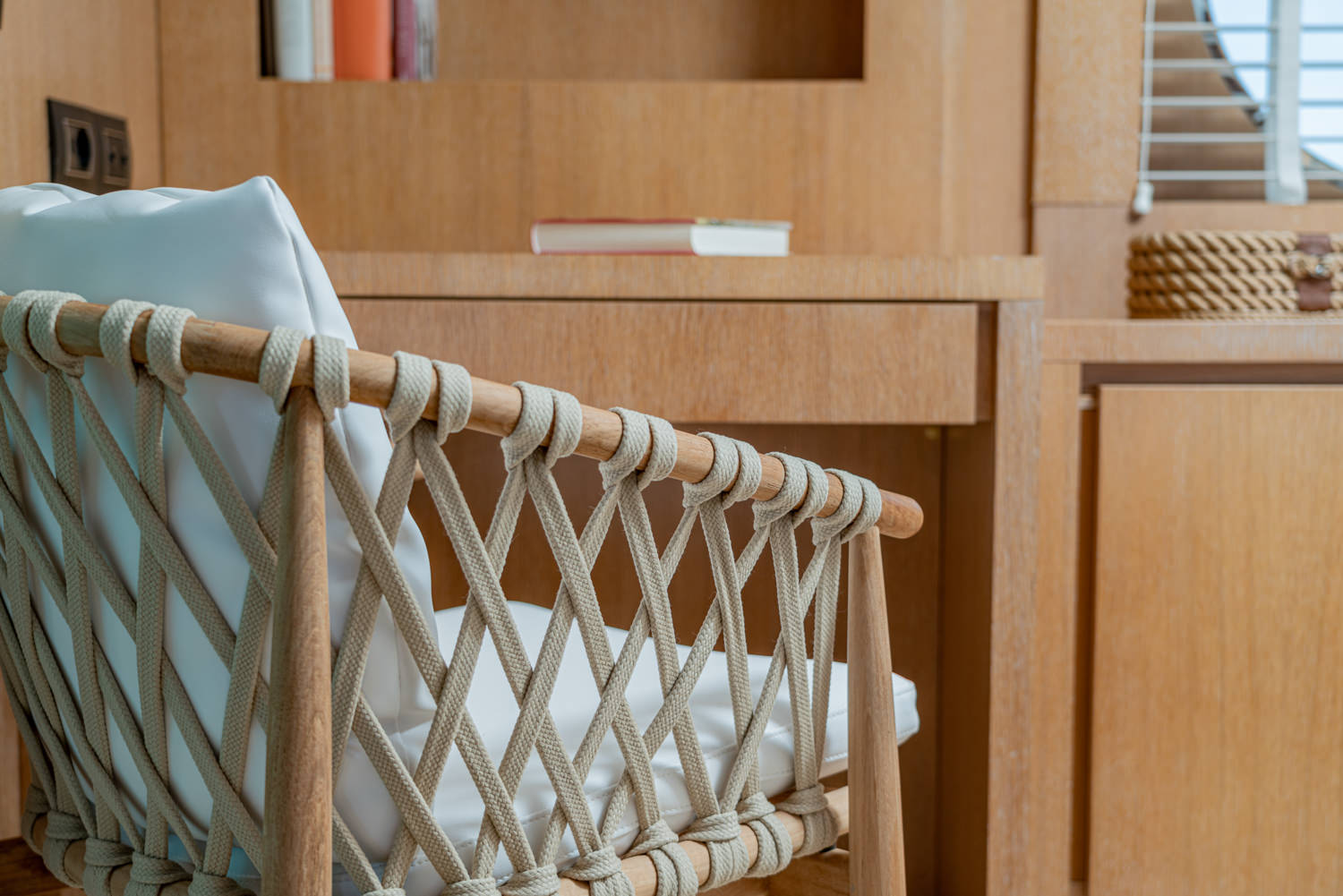 Luxury yacht bedroom detail with elegant design, photographed in Saint-Tropez.