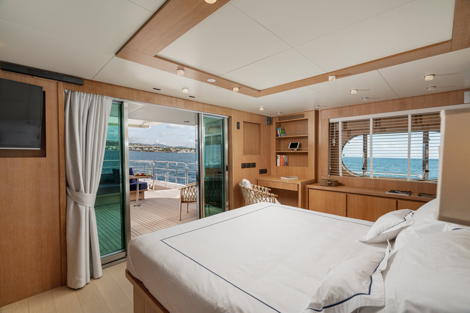 Luxury yacht master room with sophisticated design, photographed in Cannes.