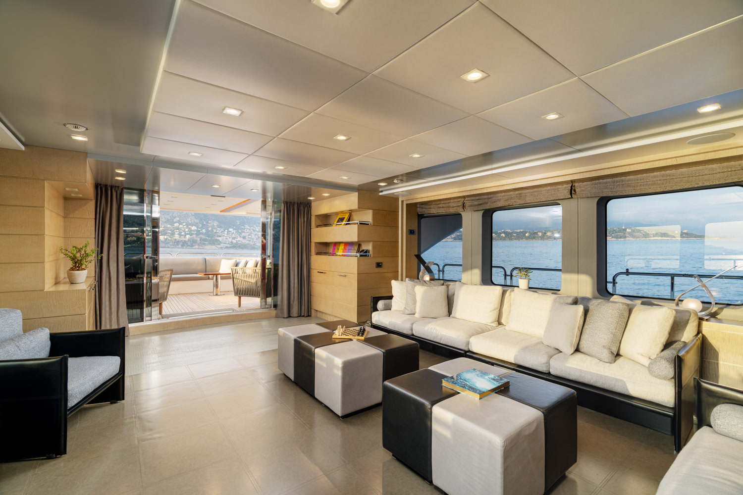 Benetti yacht main salon with modern luxury, photographed in Monaco.
