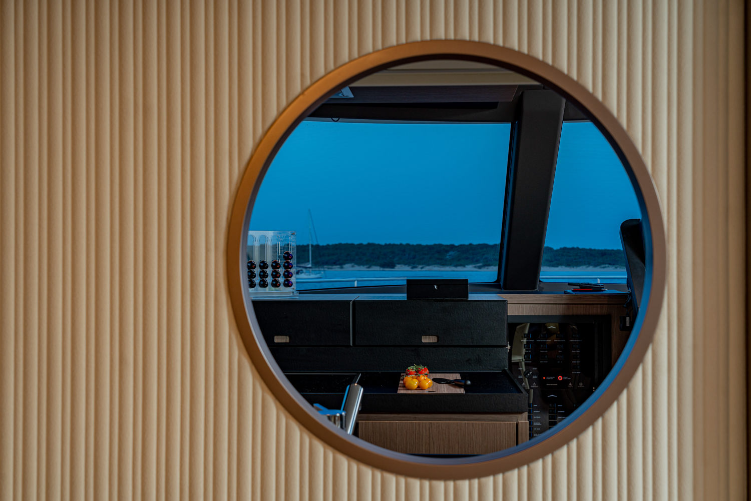 Spacious yacht saloon with panoramic windows and elegant decor in Nice.