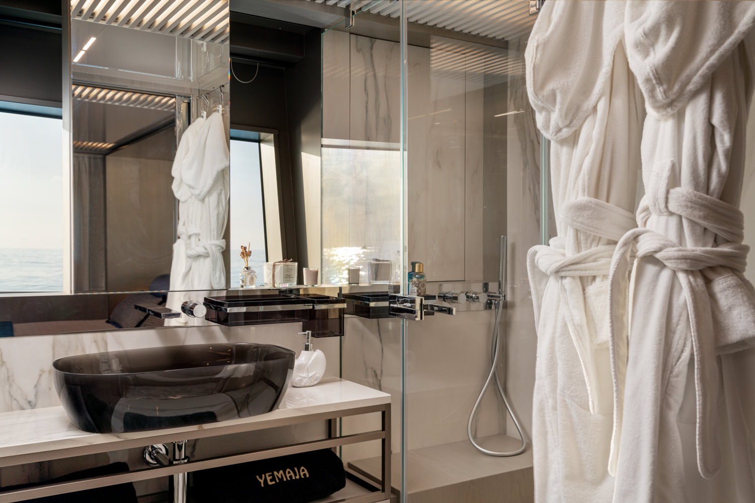 Modern yacht bathroom with shower and elegant design in Genoa.