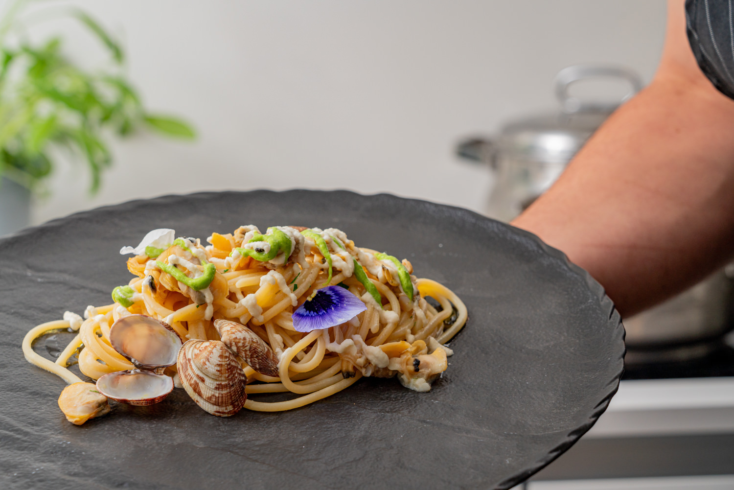 Delicious plate of spaghetti served aboard a luxury yacht, photographed in Naples.