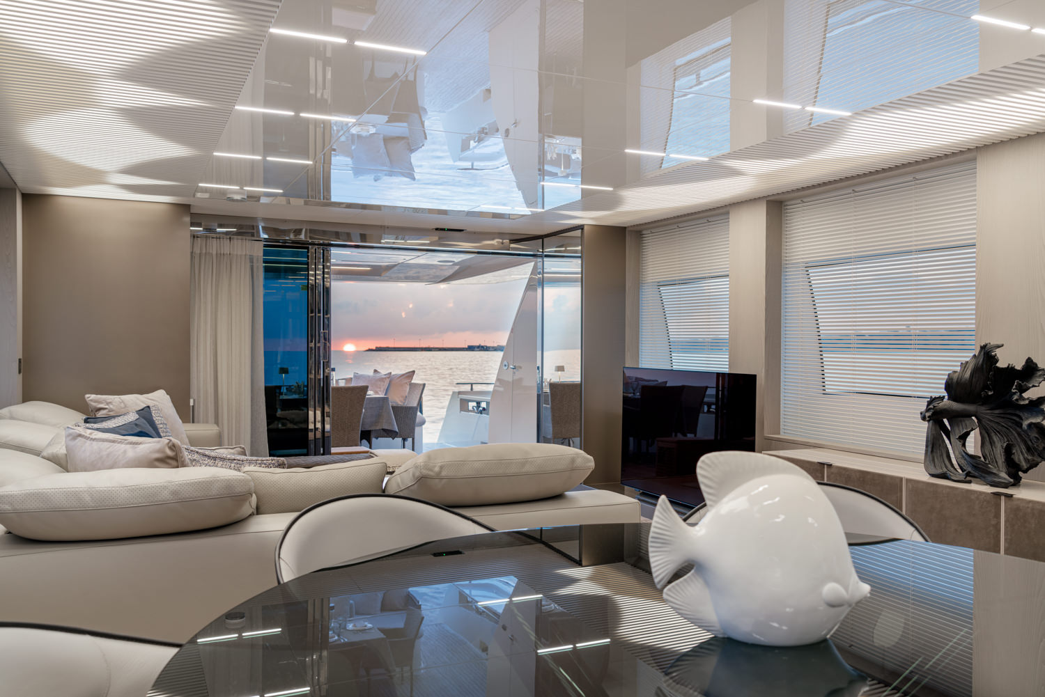 Luxury yacht main salon with contemporary design, photographed in Livorno.