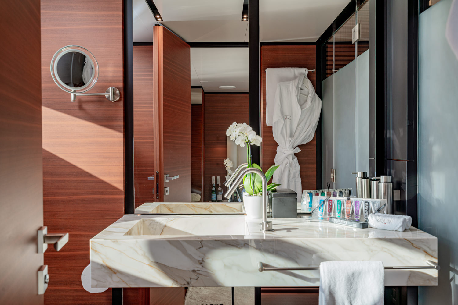 Elegant bathroom aboard a Ferretti yacht, photographed in Cannes.